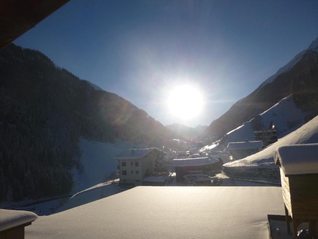 a view of the sun rising over a mountain at Haus Wildbach in Kappl
