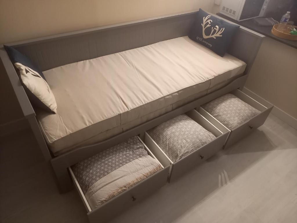 Postel nebo postele na pokoji v ubytování Le Cocon