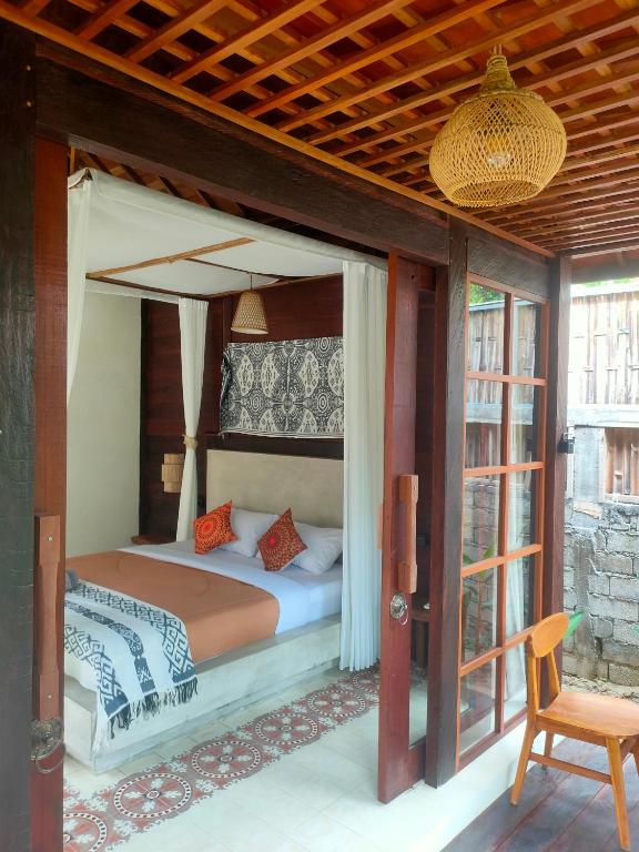 Postel nebo postele na pokoji v ubytování Vanaya Lodge