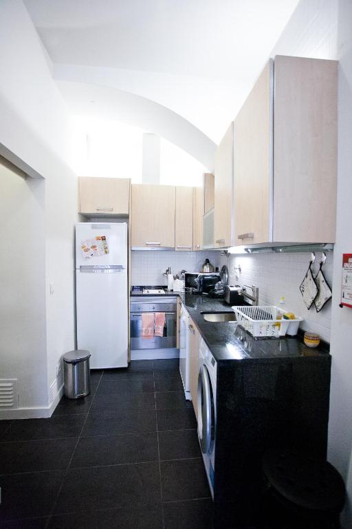 Kuchyň nebo kuchyňský kout v ubytování Downtown Apartments Bica