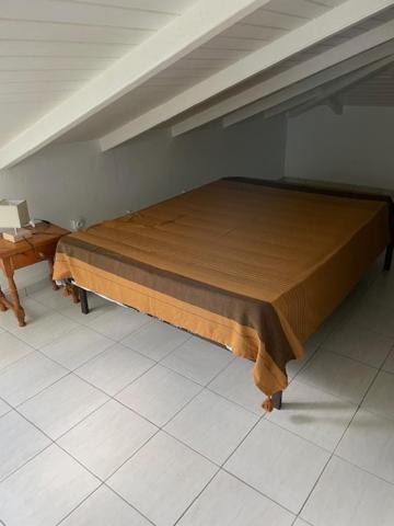 Postel nebo postele na pokoji v ubytování Villa MORINGA