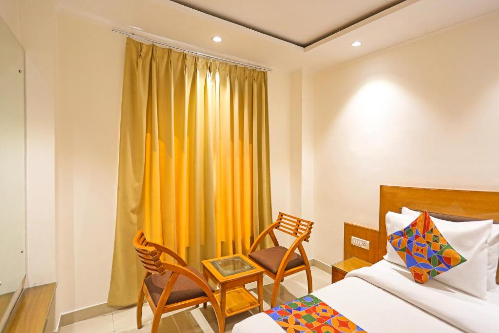 Postel nebo postele na pokoji v ubytování Hotel Fortuner, Karol Bagh, New Delhi