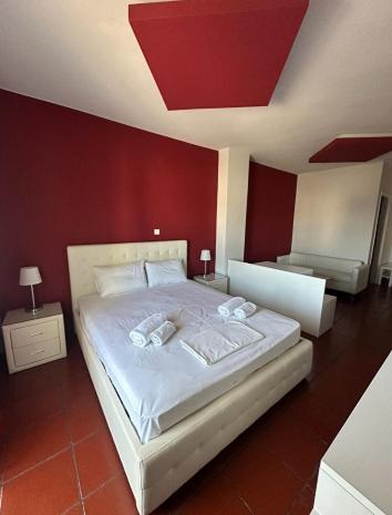 Postel nebo postele na pokoji v ubytování Scala Hotel