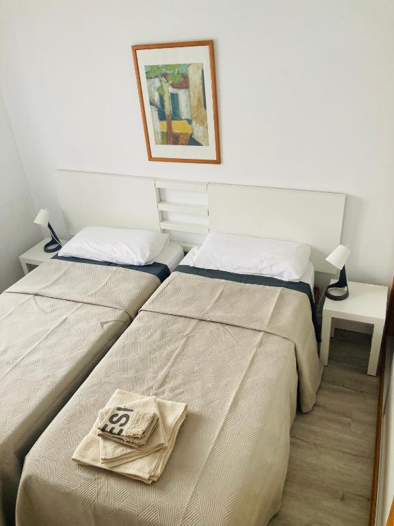 A bed or beds in a room at Sunny MASPALOMAS