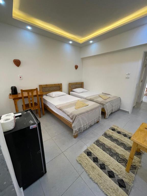 Postel nebo postele na pokoji v ubytování Mojito Dahab