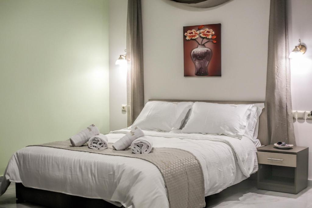 Postel nebo postele na pokoji v ubytování Del Sol #2 Meteora Luxurious Family Suites