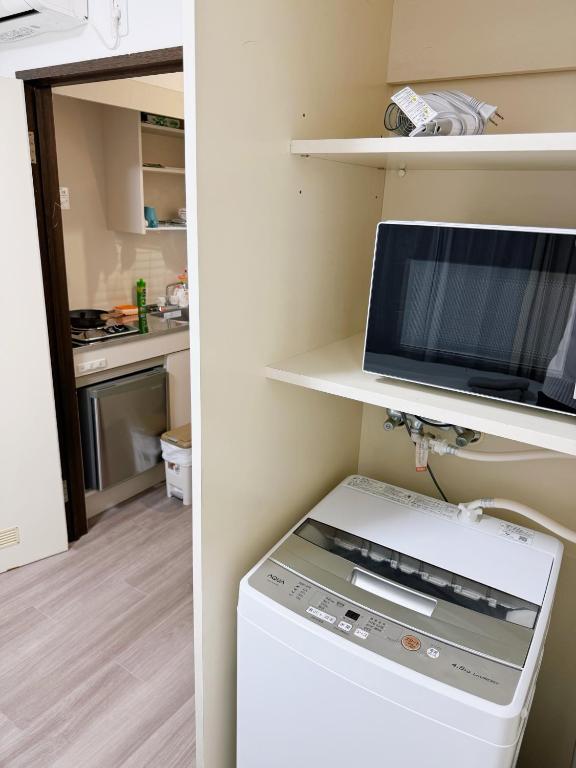 Kuchyň nebo kuchyňský kout v ubytování Tokyo Shinjuku Waseda House新宿早稲田
