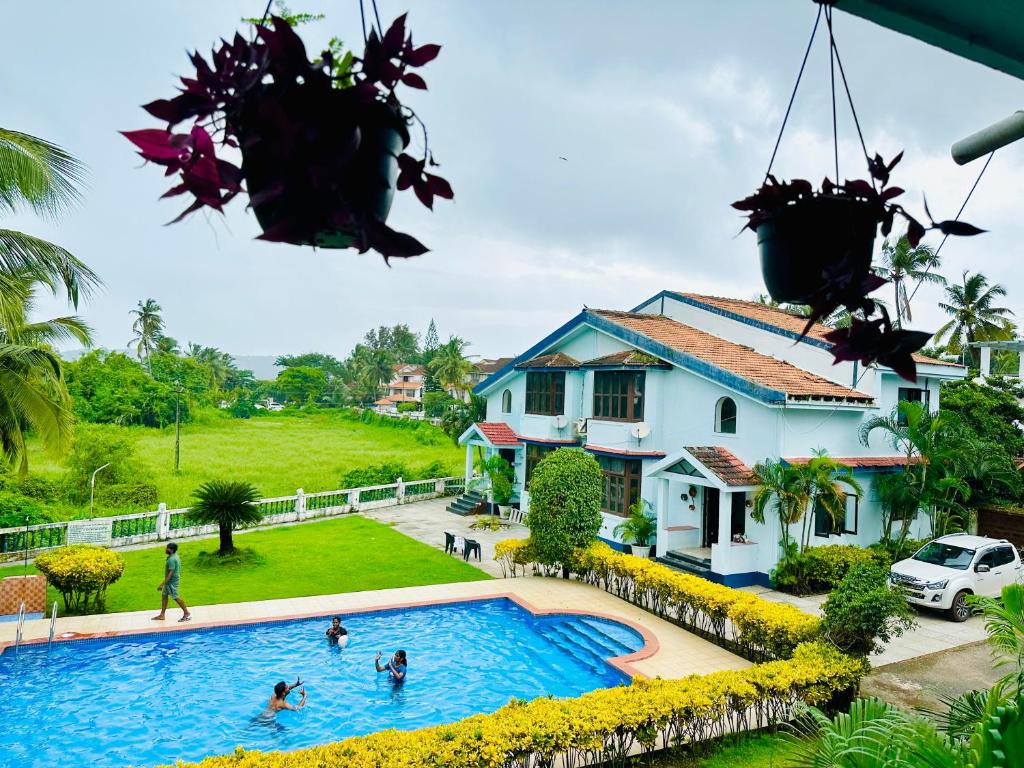 Πισίνα στο ή κοντά στο GR STAYS Beautiful 2bhk Apartment In Arpora 5 mins to Baga