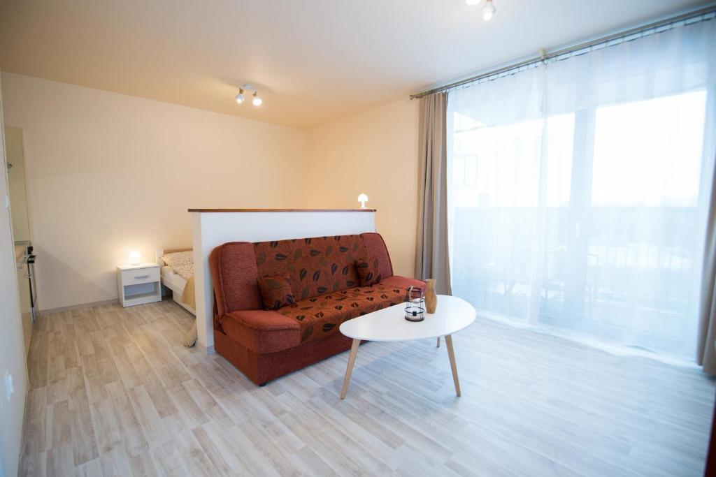 Posezení v ubytování New Cosy Apartment, close to TATRALANDIA and JASNA, parking