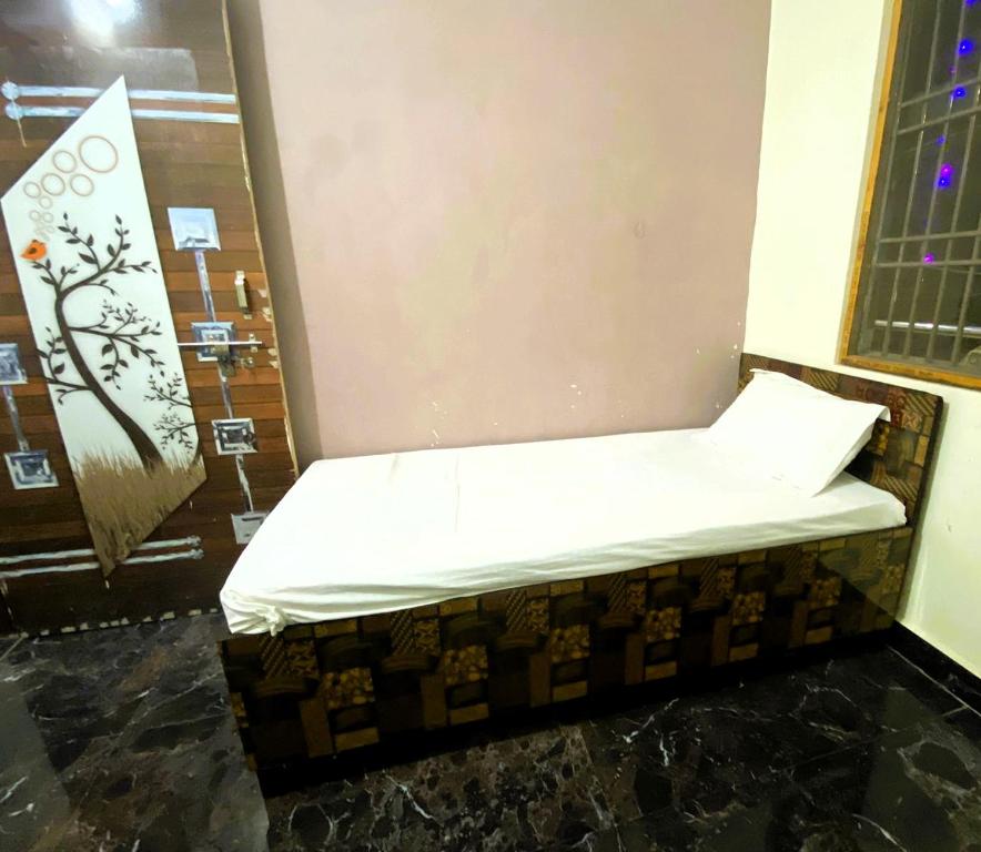Letto o letti in una camera di BSSN Guest House