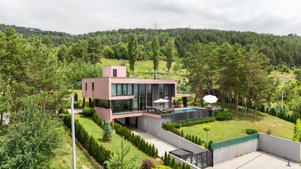 an aerial view of a house with a swimming pool at Villa Bella in Sarajevo