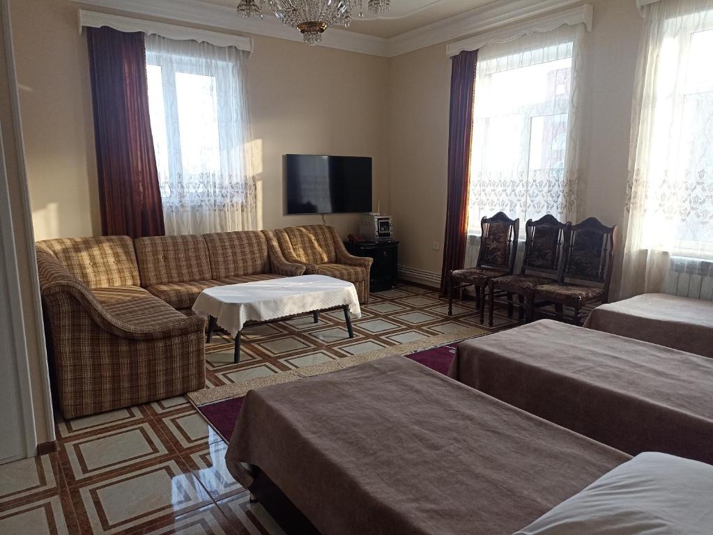 Postel nebo postele na pokoji v ubytování Erazank Hotel