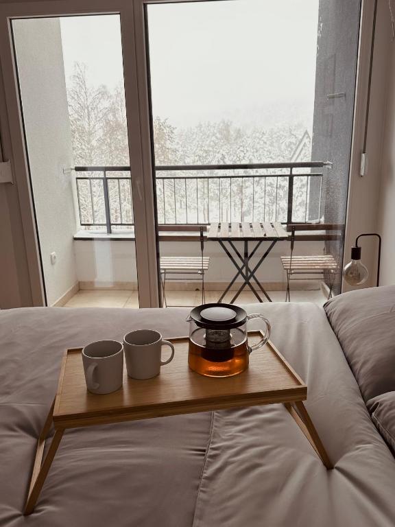 Voodi või voodid majutusasutuse The Nest Apartment toas