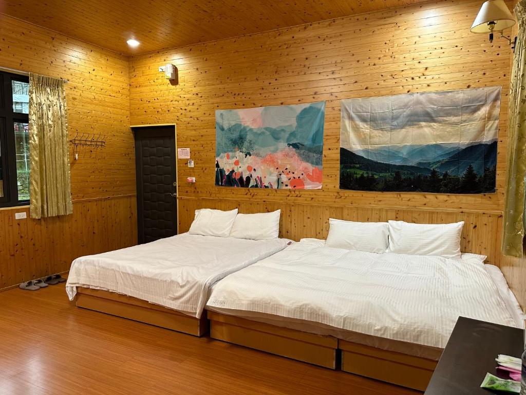 Postel nebo postele na pokoji v ubytování He Ya Leisure Land B&B