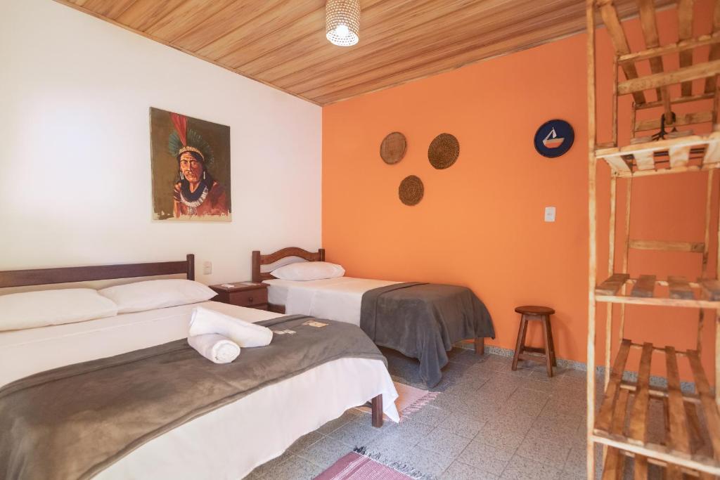 Postel nebo postele na pokoji v ubytování Pousada Carambola