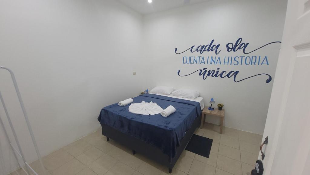 Postel nebo postele na pokoji v ubytování Surfo House Hotel & Hostel