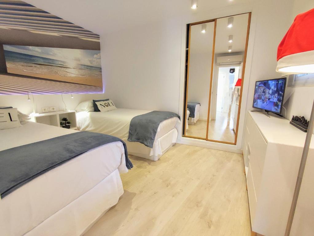 Postel nebo postele na pokoji v ubytování Casa Fuerte Playa