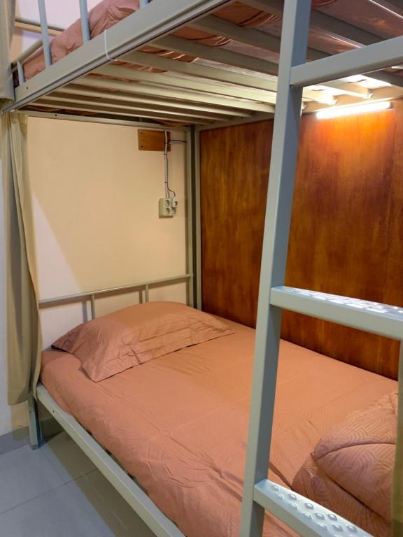 Postel nebo postele na pokoji v ubytování Backpacker Space
