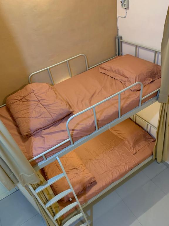 Postel nebo postele na pokoji v ubytování Backpacker Space