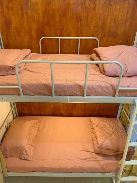 Postel nebo postele na pokoji v ubytování Backpacker Space