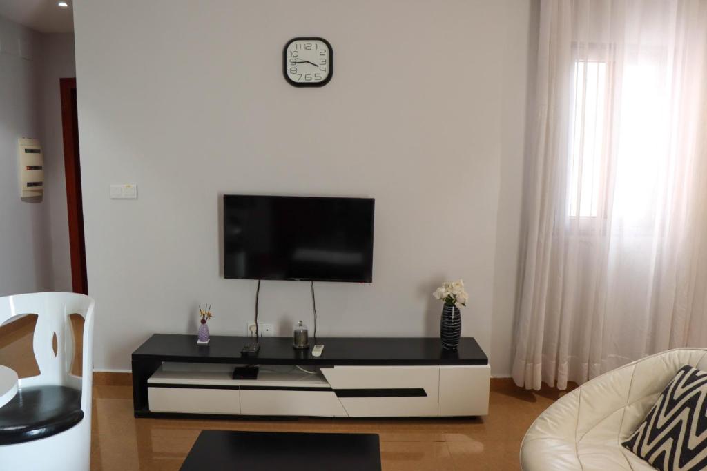 TV a/nebo společenská místnost v ubytování Residence SCI ABBAS