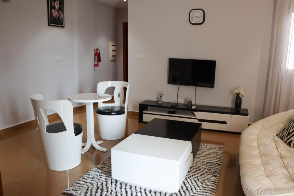 TV a/nebo společenská místnost v ubytování Residence SCI ABBAS
