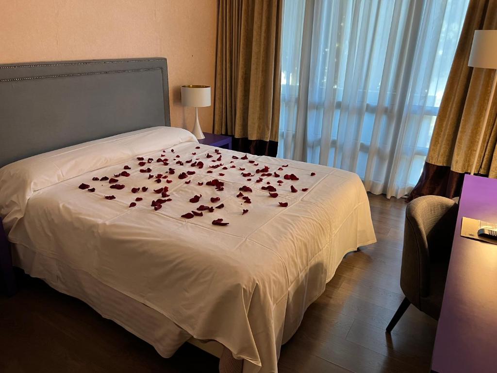 Postel nebo postele na pokoji v ubytování Hotel Fenix
