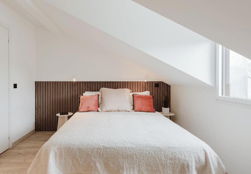 Postel nebo postele na pokoji v ubytování Appart Hotel Neostelia