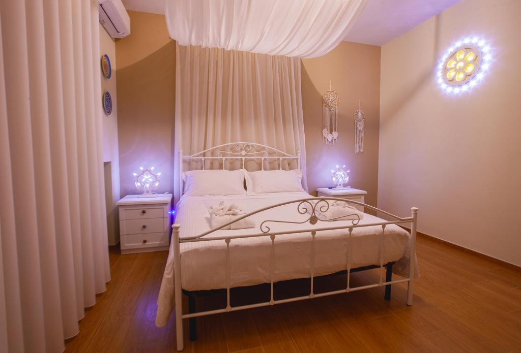 Postel nebo postele na pokoji v ubytování Alle Luminarie