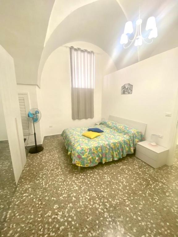 Postel nebo postele na pokoji v ubytování House Malù apartment