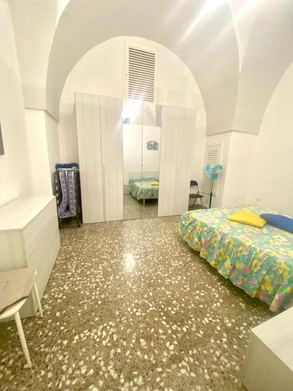 Postel nebo postele na pokoji v ubytování House Malù apartment