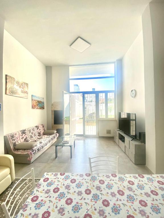 TV a/nebo společenská místnost v ubytování House Malù apartment