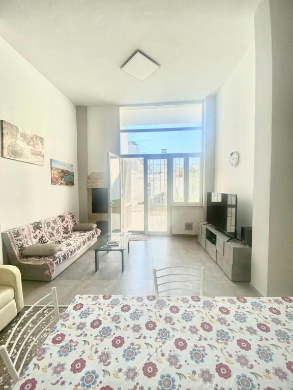 TV a/nebo společenská místnost v ubytování House Malù apartment