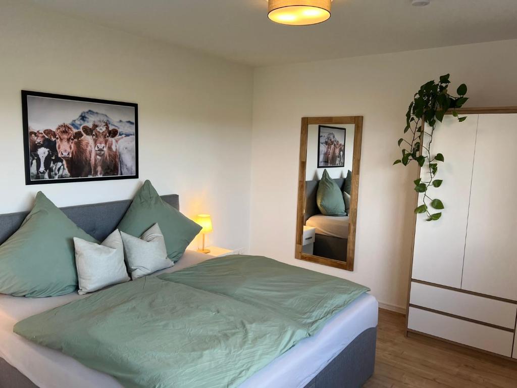 Postel nebo postele na pokoji v ubytování Ferienwohnung Mucki
