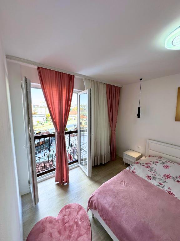 Postel nebo postele na pokoji v ubytování Sant é Apartment