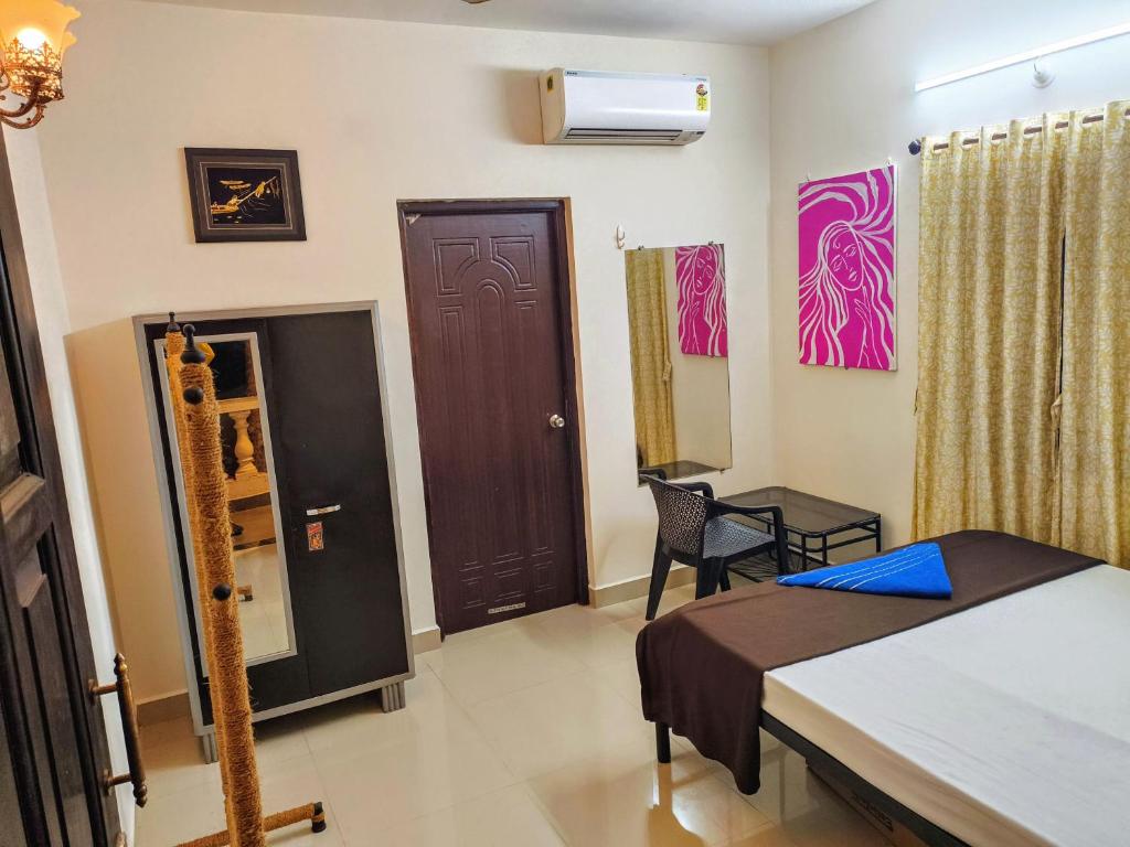 Postel nebo postele na pokoji v ubytování Coconut Inn - Parra Goa
