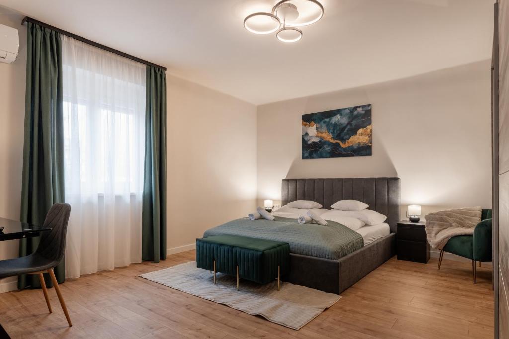 Posteľ alebo postele v izbe v ubytovaní Bem Business Suite