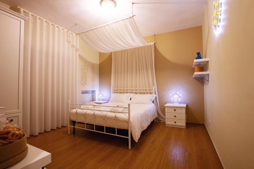 Postel nebo postele na pokoji v ubytování Alle Luminarie