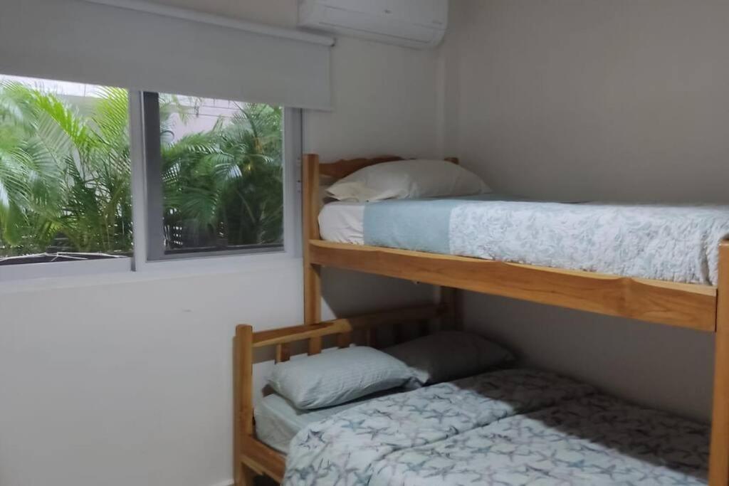Postel nebo postele na pokoji v ubytování CHAME VIBES Apartamento PB en Playa Caracol Chame