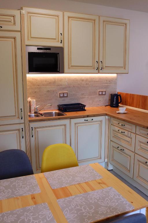 Kuchyň nebo kuchyňský kout v ubytování Apartmán Relax Pernink