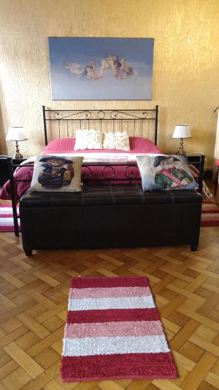 Postel nebo postele na pokoji v ubytování B&B Amarantha Gothica Genoa