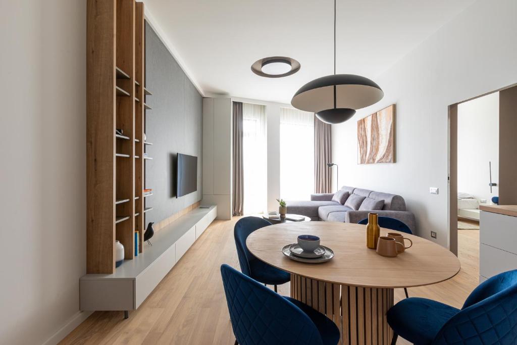 Ruang duduk di Cosy Easy Apartment