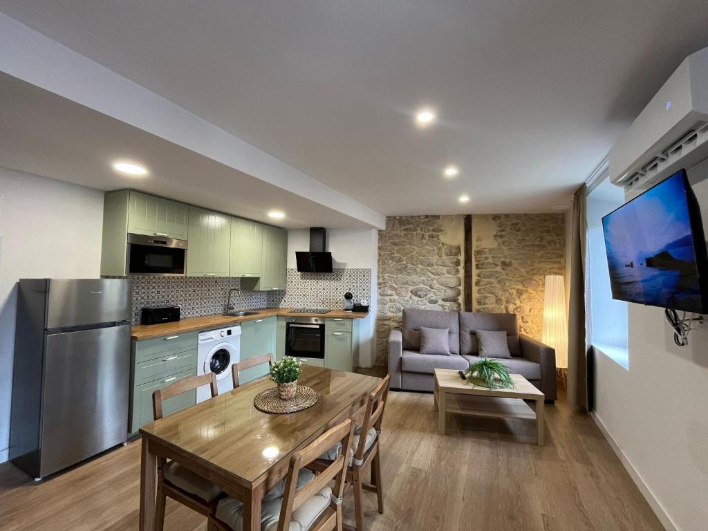 Η κουζίνα ή μικρή κουζίνα στο Apartamentos Villacarriedo