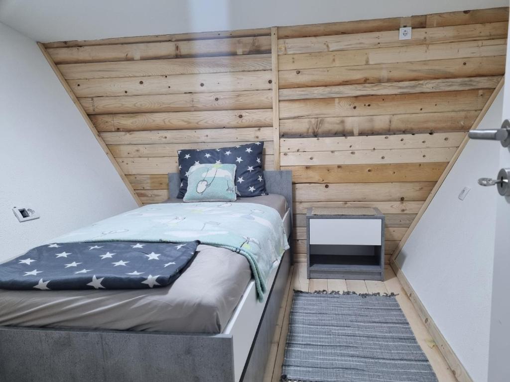 Postel nebo postele na pokoji v ubytování Kutak Maša