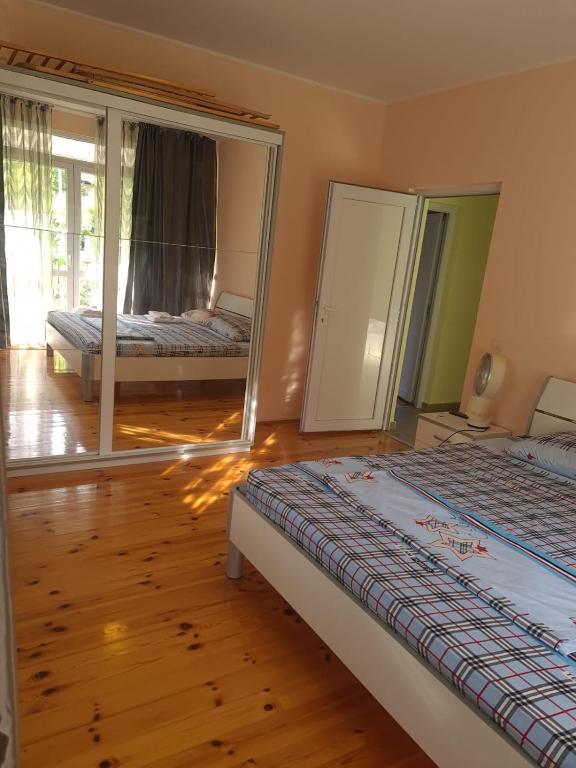 Postel nebo postele na pokoji v ubytování Villa Nadija