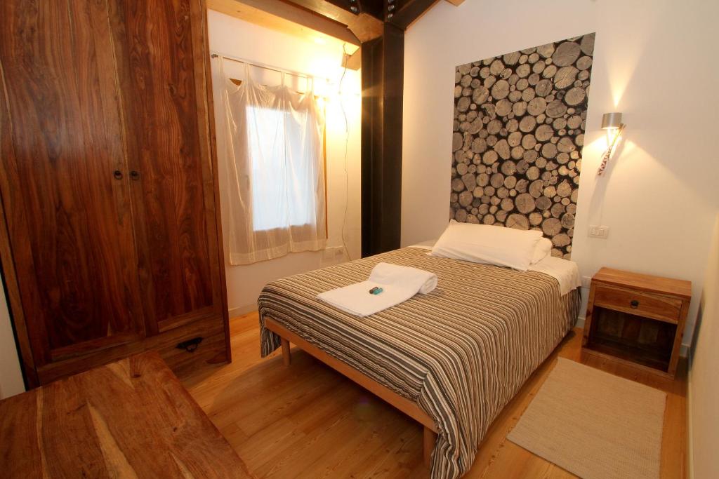 Posteľ alebo postele v izbe v ubytovaní Agriturismo Richeton