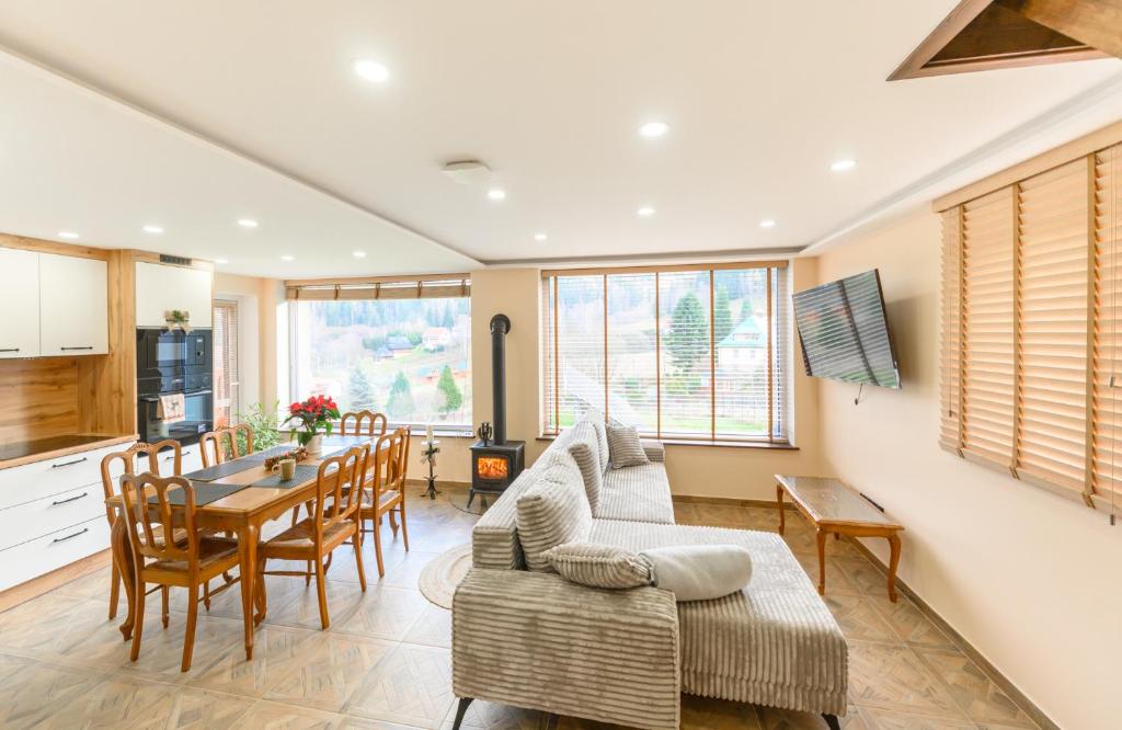 Μια τηλεόραση ή/και κέντρο ψυχαγωγίας στο Apartament Podgórze