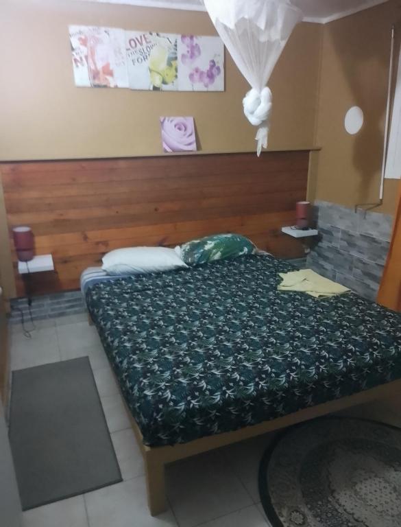 Postel nebo postele na pokoji v ubytování Gîtes La Troisième Chute