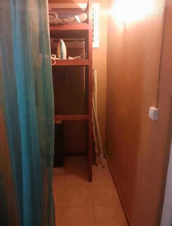 Palanda nebo palandy na pokoji v ubytování Gîtes La Troisième Chute