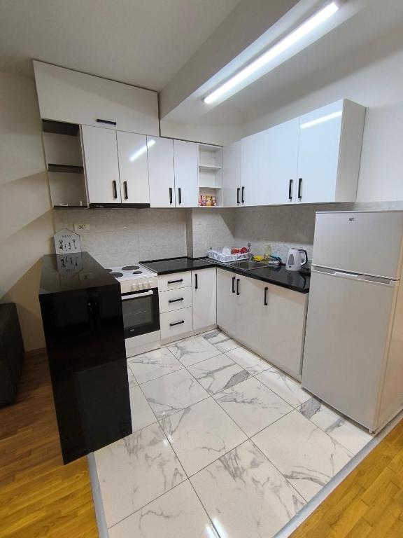 Køkken eller tekøkken på Apartmani D&N
